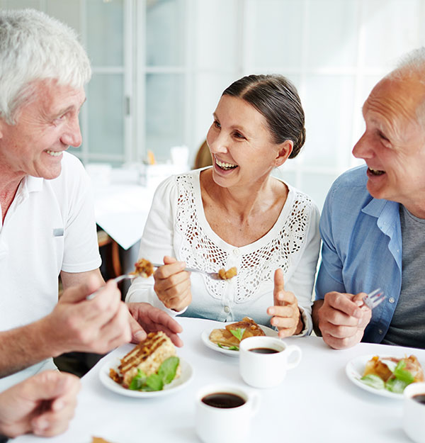 cheerful-senior-friends-having-tasty-dessert cheerful-senior-friends-having-tasty-dessert